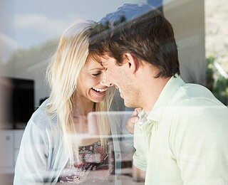 Couple at home --- Image by © Tomas Rodriguez/Corbis